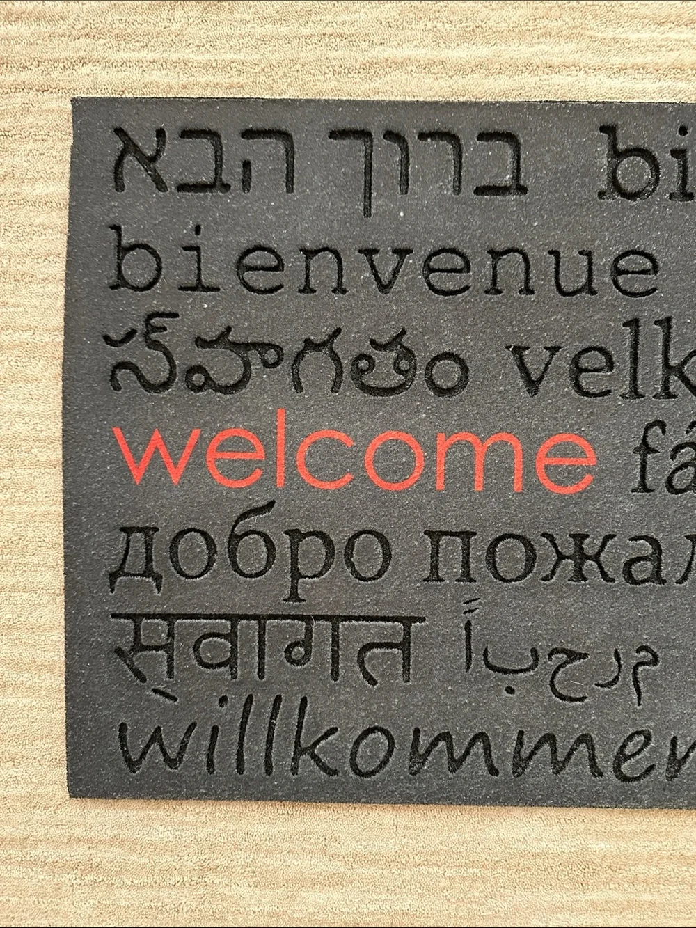 Room Essentials™ Multilingual Welcome Doormat - Black with Red Welcome 30” x 18”